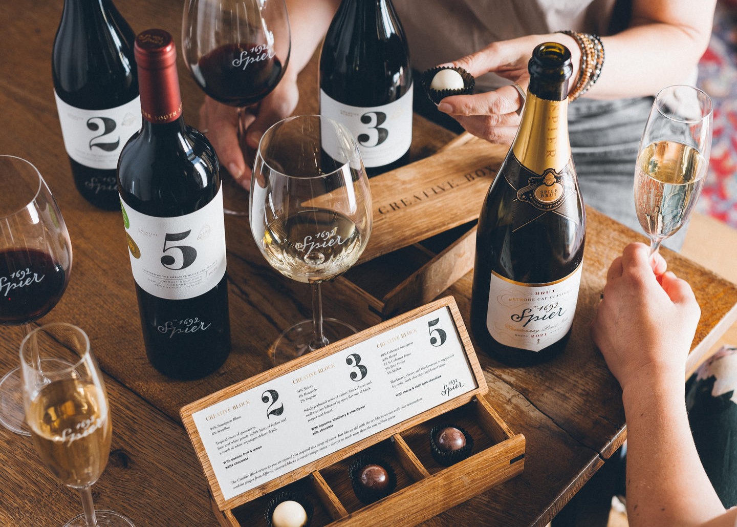spier-chocolate-tasting A selection of wines and sparkling wine, paired with chocolates, and presented alongside a tasting menu at Spier Winery.
